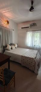 Ένα ή περισσότερα κρεβάτια σε δωμάτιο στο Kritarth +12 φωτογραφίες