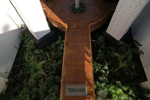 a spiral staircase in a building with plants at Hotel Mundo Maya Palenque in Palenque +83 photos