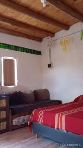 Et opholdsområde på Cabaña Agata San Marcos Sierras