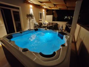 a jacuzzi tub in the middle of a room at Villa Dora in Omiš centar now with Jacuzzi in Omiš