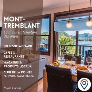 un prospectus pour un restaurant avec une table avec des verres à vin dans l'établissement Lakefront Mountain View - Resort Loft, à Lac-Supérieur