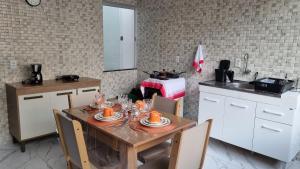 Kuchyň nebo kuchyňský kout v ubytování Casa aconchegante e bem localizada - São Brás + 6 fotografií