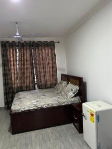 Postel nebo postele na pokoji v ubytování 2 Bedroom Retreat at Tema Community 22 + 8 fotografií