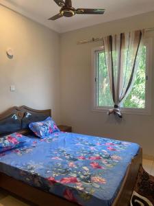 Postel nebo postele na pokoji v ubytování Kebbeh Apartments