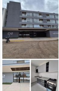 a building with a motorcycle parked in front of it at Arévalo - D2 in Cipolletti +1 photo