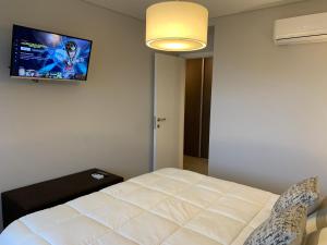 En eller flere senge i et værelse på Rent a Flat