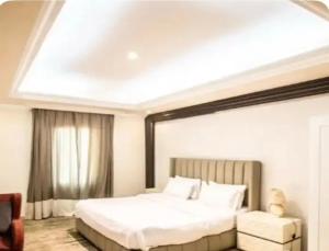 Postel nebo postele na pokoji v ubytování daniel's village