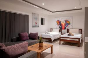 Postel nebo postele na pokoji v ubytování Villa Sawadee 5 By Sp Villa Management + 41 fotografií