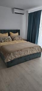 En eller flere senge i et værelse på Vera Home 4