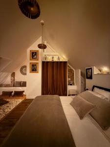 Postel nebo postele na pokoji v ubytování Ecrin de Charme