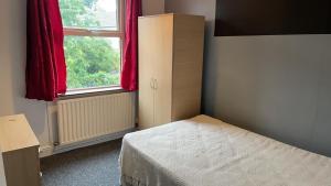 Postel nebo postele na pokoji v ubytování Wentworth Manor + 5 fotografií