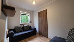 Χώρος καθιστικού στο Domek w Karkonoszach 1 pod Karpaczem