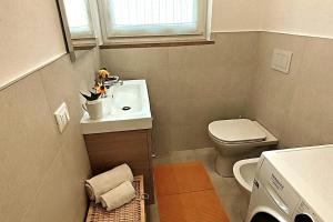 Koupelna v ubytování Altopiano di Asiago Apartment + 12 fotografií