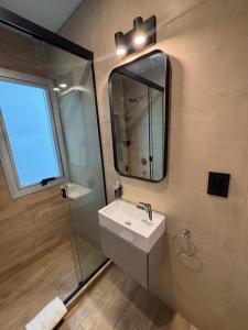 Koupelna v ubytování Nuevo Centro Hotel Mendoza + 10 fotografií