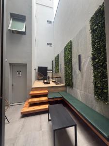 TV a/nebo společenská místnost v ubytování Nuevo Centro Hotel Mendoza