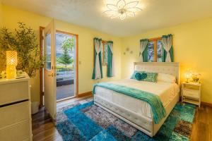 a bedroom with a bed and a window at Panorama Point - Sauna, hot tub, theater room in Davis +53 photos