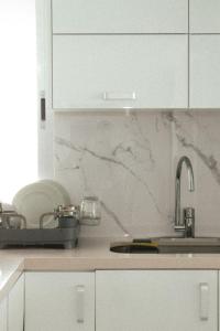 Η κουζίνα ή μικρή κουζίνα στο Naia Mar