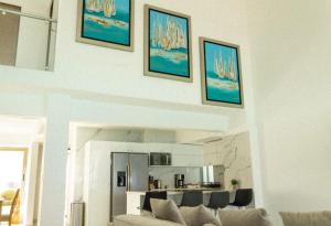 a living room with a couch and a table at Naia Mar in Cancún