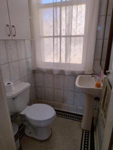 Ένα μπάνιο στο Hostal Casa Patrimonio Valparaíso