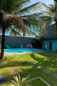 Πισίνα στο ή κοντά στο Casa de Praia Suítes