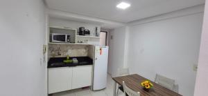 Kuchyň nebo kuchyňský kout v ubytování Apartamento 303 - Terrazzas Flat + 8 fotografií