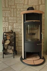 a tv sitting in front of a brick wall at Ferienhaus Wiek in Wiek auf Rügen 