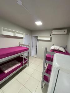 Katil atau katil-katil dalam bilik di Pousada