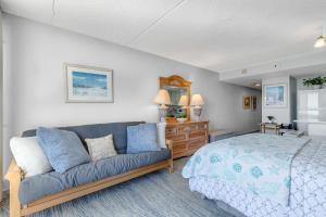 Ένα ή περισσότερα κρεβάτια σε δωμάτιο στο Golden Sands 1109 +24 φωτογραφίες