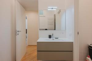 a bathroom with a sink and a mirror at La Casa di Biancaneve in Recco +31 photos