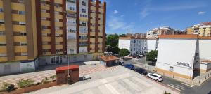 an overhead view of a city with buildings at Rooms Tourist Apartment in Huelva
