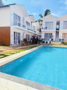 Πισίνα στο ή κοντά στο Ashvem beach resort by Tvessa