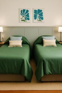 Postel nebo postele na pokoji v ubytování Madaro House