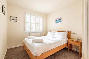 Ένα ή περισσότερα κρεβάτια σε δωμάτιο στο Baker Lane No 15