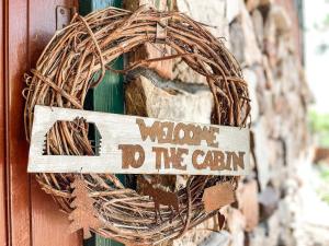 Πιστοποιητικό, βραβείο, πινακίδα ή έγγραφο που προβάλλεται στο Peaceful Mountainside Cabin Retreat