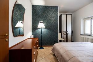 Postel nebo postele na pokoji v ubytování Casa Turbigo-Malpensa-Milano