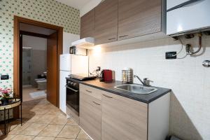 Kuchyň nebo kuchyňský kout v ubytování Casa Turbigo-Malpensa-Milano