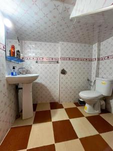 a bathroom with a sink and a toilet at Wave Stay Hostel - Sea View in Agadir +144 photos