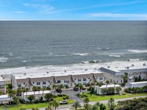 an aerial view of a resort and the ocean at PVB Wellness Retreat in Ponte Vedra Beach