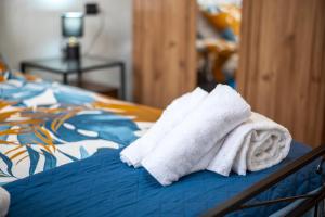 Ένα ή περισσότερα κρεβάτια σε δωμάτιο στο La Dimora Del Sor Bruno