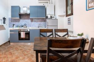 Η κουζίνα ή μικρή κουζίνα στο La Dimora Del Sor Bruno