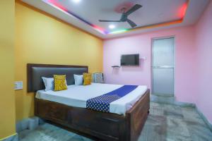 Ένα ή περισσότερα κρεβάτια σε δωμάτιο στο Hotel O Bright +21 φωτογραφίες