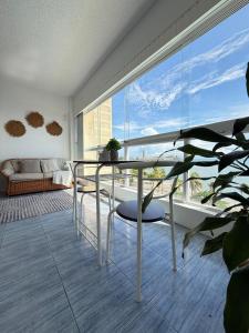 Katil atau katil-katil dalam bilik di Acogedor Estudio con acceso directo a la playa