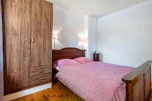 Postel nebo postele na pokoji v ubytování Ferienwohnung Halunder