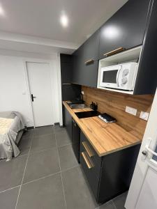 Η κουζίνα ή μικρή κουζίνα στο Cozy apartment