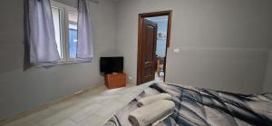 Μια τηλεόραση ή/και κέντρο ψυχαγωγίας στο Sp Luxury Room - Catania