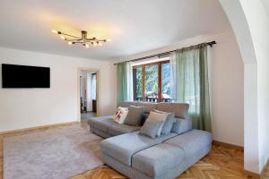 Et tv og/eller underholdning på Spazioso Appartamento a Courmayeur