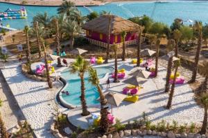 an aerial view of a pool at a resort at واحة ايلة ازور in Aqaba