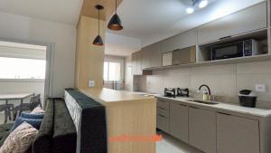 a kitchen with a sink and a counter top at Apartamento em Bauru com Vista para Montanha in Bauru +24 photos