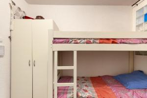 Ένα ή περισσότερα κρεβάτια σε δωμάτιο στο Chez Alain et Martine