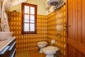 Koupelna v ubytování Villetta degli Ulivi + 18 fotografií